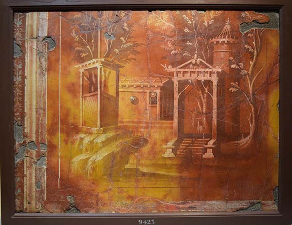 Villa dei Papiri, Herculaneum. East wall of ala (d). Monochrome landscape fresco.
Now in Naples Archaeological Museum. Inventory number 9423.
According to Esposito, the observation of the remains still in situ in the two alae and of the fragments detached during the excavation of the end of the last century from the ala (d) confirm the provenance of these environments, most likely from the east wall of the ala (d) of the two fragments with monochromatic landscapes preserved at the Naples Museum.
Imitating panels of orthostats decorated with monochrome are often used in the middle of the II style walls.
The closest comparison can be established with the monochrome landscapes painted in the antechamber of the triclinium (14) of the villa A of Oplontis. At other times the monochrome panels are placed inside an aedicula located in the centre of the wall, as seen in room (23) of the same villa in Oplontis, or in the two fragments from the so-called villa of the Royal Stables in Portici.
See Esposito D., 2010. Le pitture della Villa dei Papiri ad Ercolano in La Villa Romaine de Boscoreale et ses Fresques. édicions errance: Musée royal de Mariemont. p. 215, figg. 7, 8, 9.